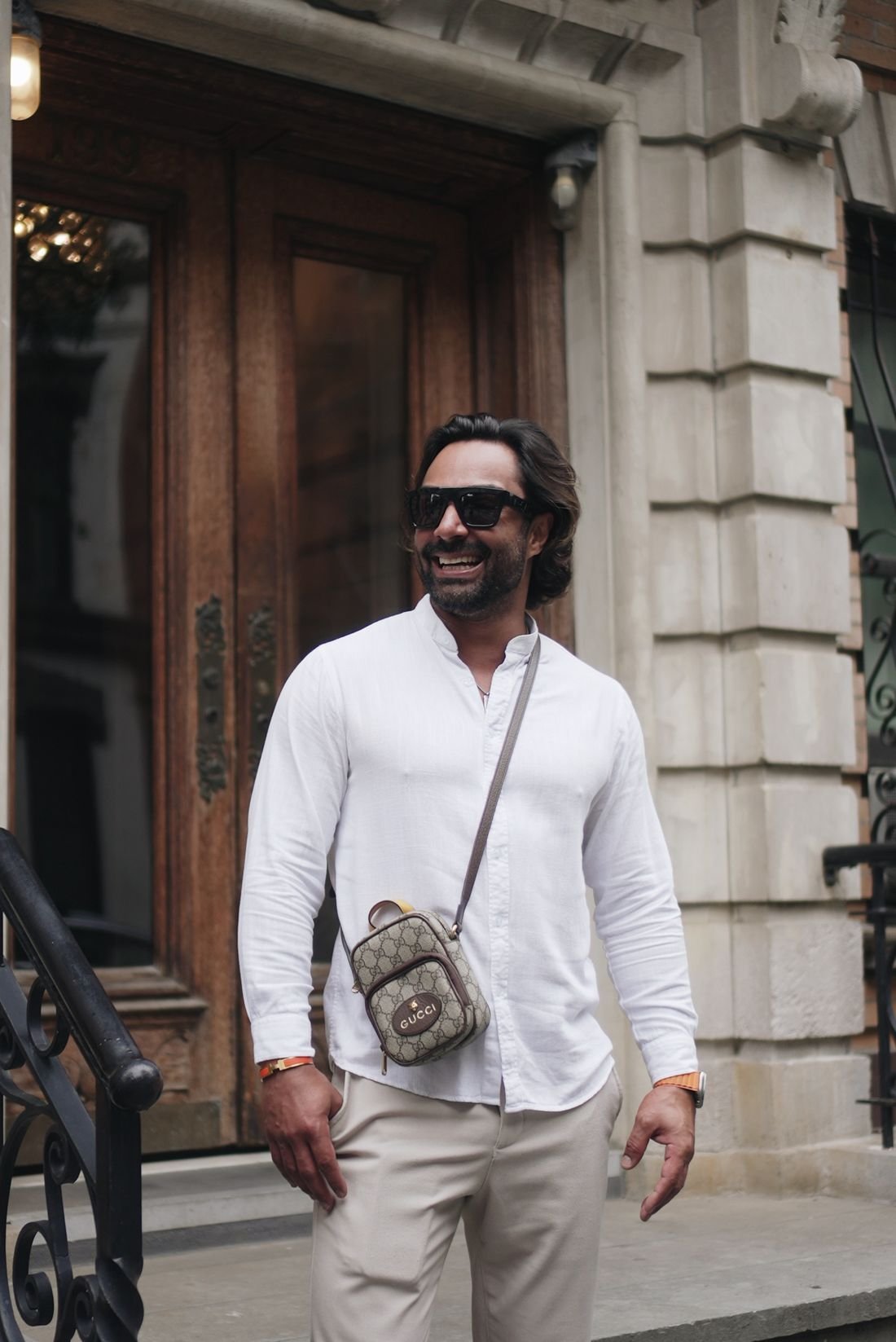 Alexandre Gironde outside a brownstone